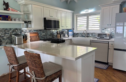 Estate South Slob Villa | Diamond in Paradise-Hear the waves, feel the breezes from this 3 bedroom villa!