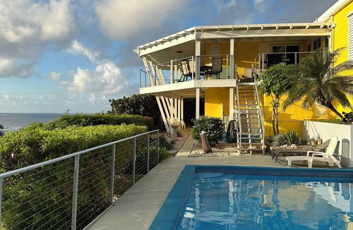 Estate South Slob Villa | Diamond in Paradise-Hear the waves, feel the breezes from this 3 bedroom villa!