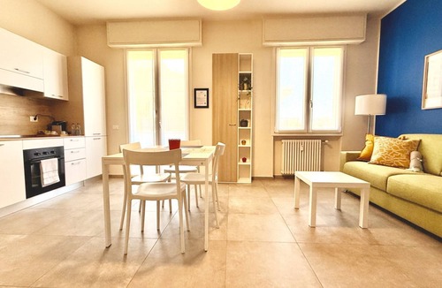 Prato Apartment | Discover Apartment Dante, an elegant residence located in a quiet area just 15 minutes from Florence. Tastefully furnished with high-end finishes, this apartment is designed for those seeking a refined environment that meets every need.Perfect for famili
