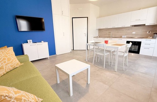 Prato Apartment | Discover Apartment Dante, an elegant residence located in a quiet area just 15 minutes from Florence. Tastefully furnished with high-end finishes, this apartment is designed for those seeking a refined environment that meets every need.Perfect for famili