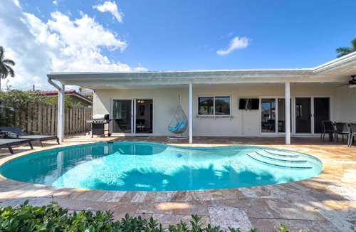 Coral Ridge Isles House | Dockside Daydreams - Canalfront and Pool Oasis