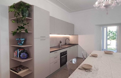 Carpegna Apartment | Elegance and relaxation in an exclusive ground floor apartment flooded with light.
