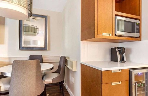 West End Resort | Elegant Georgetown Retreat | Hilton 1BR Suite | Walk to Shops & Dining | The Dis