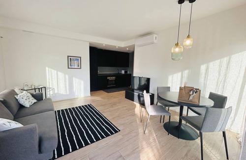 Alba Apartment | Elegant newly built apartment, located on the ground floor. Internally it consists of entrance on living room and kitchenette, double bedroom, twin bedroom, two bathrooms with shower. To complete the property large private garden and double outdoor parki