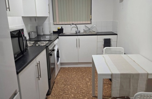 Custom House House | Emerald Apartment Sleeps 4 with Parking