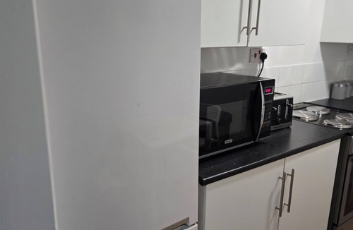 Custom House House | Emerald Apartment Sleeps 4 with Parking