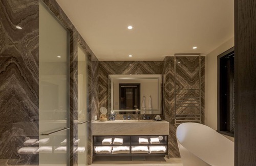 Tor Hotel | Experience Comfort & Style in a Mountain-View Room Perfect for Relaxation