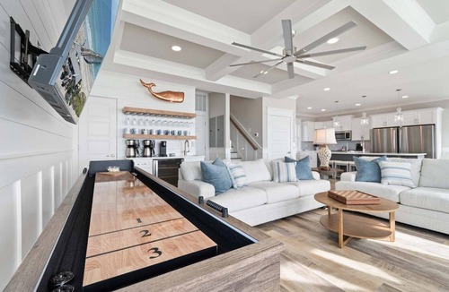 Oak Island House | Experience luxury at '7 Day Weekend,' an oceanfront 7-bedroom retreat in Oak Island.