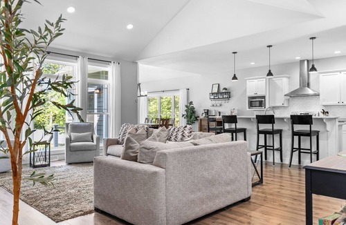 Coloma House | Family Friendly lake home, beach, level lot, fire pit, game room, dog friendly!
