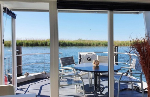 Lelystad Boat Rental | Floating lodge with Terrace in Lelystad