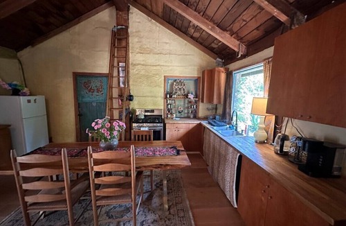 Topanga House | FRENCH 1914 STONE CABIN w/clawfoot bathtub, fireplace + private trails & creek