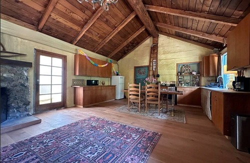 Topanga House | FRENCH 1914 STONE CABIN w/clawfoot bathtub, fireplace + private trails & creek