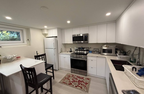 Canyon Heights House | Fully furnished one bedroom and den basement with separate entrance