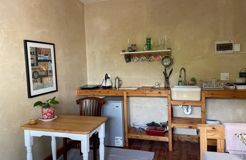 Cape Peninsula Cottage | Garden Cottage with Hot Tub in beautiful eco village - 5 mins walk to the beach
