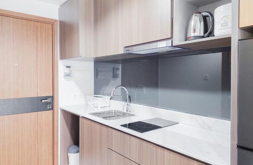 Pinang Apartment | Good and Restful 1BR at The Smith Alam Sutera Apartment By Travelio