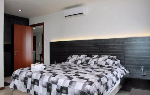 Pluit Apartment | Green Bay Condominium by Kevin