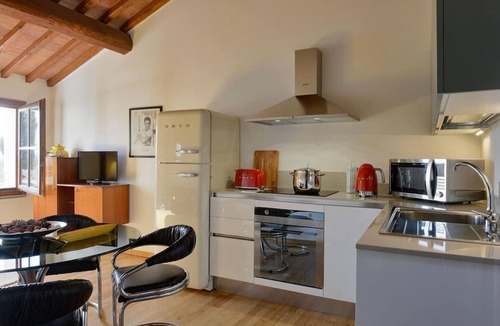 Capannoli Apartment | Green Bike Vintage - Countryside Tuscany Apartment with Pool