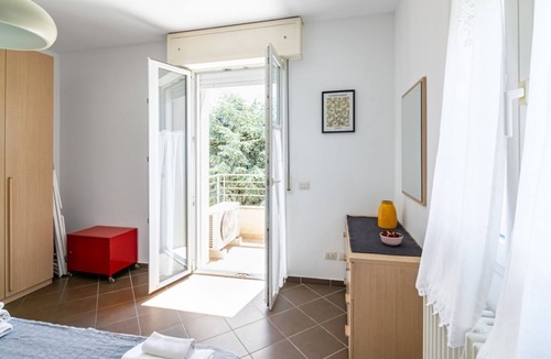 Rivabella Apartment | GuestHost - 100 meters from the sea and 2 km from the fair, our apartment is located on the second and last floor of a building with a lift (NOT suitable for disabled people). There are two steps at the entrance.In 45 m2 of space it comfortably accommoda