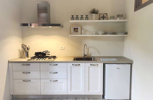 Chianni Apartment | Historical Tuscan home with 3 bedrooms and 2 baths with beautiful views.