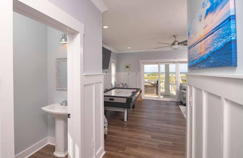 Holden Beach House | Hobbs Realty - "Coast is Clear," an oceanfront home with a heatable pool, hot tub, and elevator.