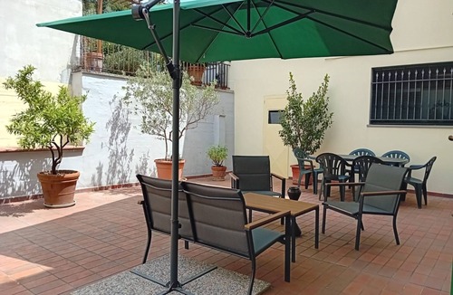 Calenzano House | Holiday Home 'Casa Olimpia' with Private Terrace, Balcony and Air Conditioning
