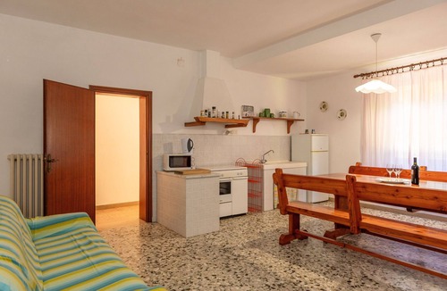 Fauglia House | Holiday Home 'Poggio1' with Shared Pool, Shared Garden and Wi-Fi