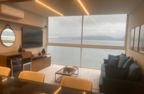 Ponta Leste Apartment | Home Sweet Sea. Beachfront Retreat: Luxury, Comfort and Exclusive SPA