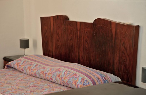 Arzeno Apartment | In the square, a step away from the sea