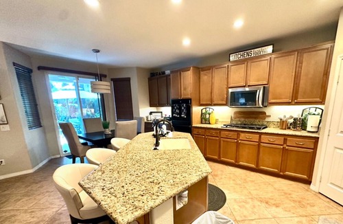 Lake Elsinore House | Kimberly's Chandelier Château Salt Pool & XL Hot Tub
