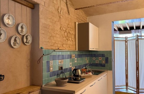Albinea Apartment | La Maison Deux, an old farmhouse from the late 18th century, with Provençal features.