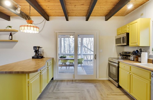 East Stroudsburg House | Lake Retreat: Hot Tub, Sauna, Game Room, Stream, EV and Stunning Backyard Views