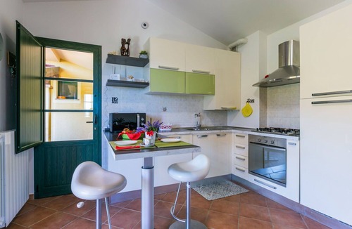 Castellina Marittima Apartment | Lovely apartment for 2 guests with pool, A/C, WIFI, TV, balcony and pets allowed