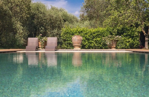 Campiglia Villa | Lovely apartment in villa for 2 guests with pool, WIFI, TV, patio and pets allowed