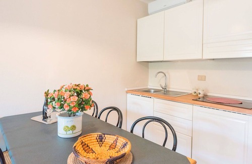 Marina di Bibbona Apartment | Lovely apartment for 4 guests with A/C, pool, WIFI, TV and patio
