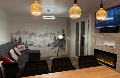 Albertville Apartment | loyika , résidence avec caméra et digicode possibilité location voiture Mercedes ,garage ,T3 climatisation ,cheminée, Netflix, petit déjeuner offert, boisson rafraîchissante pour la bienvenue, repas du soir fondue, raclette , barbecue sur demande