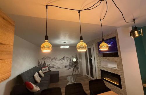Albertville Apartment | loyika , résidence avec caméra et digicode possibilité location voiture Mercedes ,garage ,T3 climatisation ,cheminée, Netflix, petit déjeuner offert, boisson rafraîchissante pour la bienvenue, repas du soir fondue, raclette , barbecue sur demande