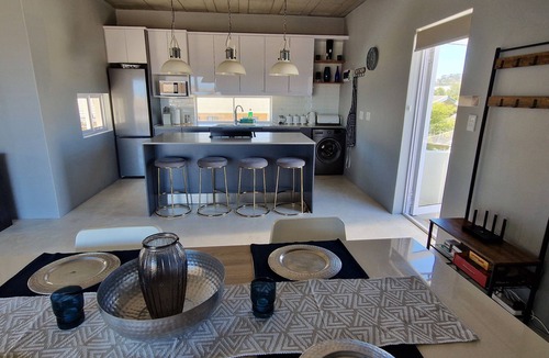 Sandbaai Apartment | Luxury 2 Bed Apartment with rooftop terrace, 3 balconies, mountain & sea views.
