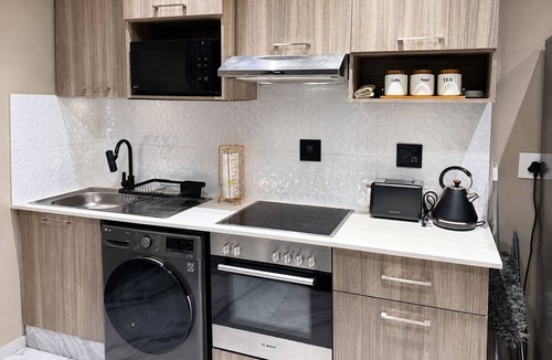 Greater Johannesburg Metropolitan Area Apartment | Luxury Rosebank Apartment - Pool - Cinema - Backup Power - Secure Parking