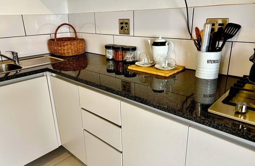 Greater Johannesburg Metropolitan Area Apartment | Luxury Skyline Escape - with a Cosy Pool and Barbecue Area and City lights View
