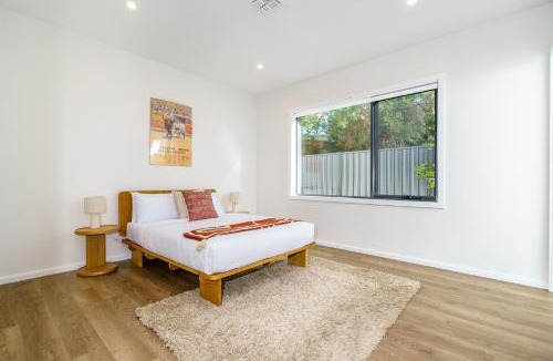 Ainslie House | New 4 bedroom city home with Tesla charger - Hosted by CanStay