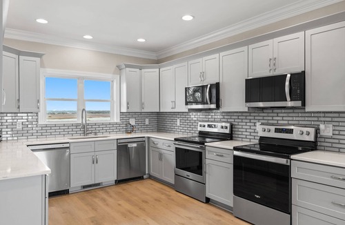 Oak Island House | Oceanfront West Point in Oak Island: 12 bedrooms, sleeps 30, with luxury amenities.