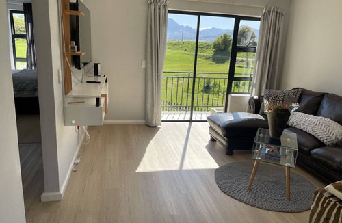 Gordon's Bay Apartment | On a golf estate with Mountain views. 4km from the Beach