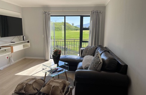 Gordon's Bay Apartment | On a golf estate with Mountain views. 4km from the Beach