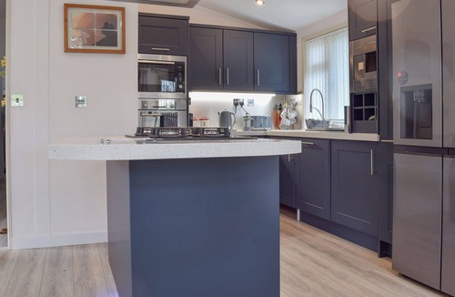 Tiddington Cottage | Overlooking the River Avon is this beautiful, peaceful and serene lodge.