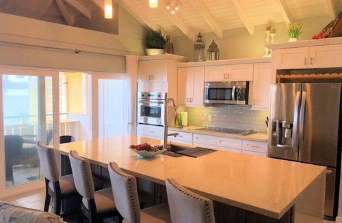 Estate Golden Rock Condo | Paradise Found - 2 bed/2 bath beachfront condo- beach and pool.