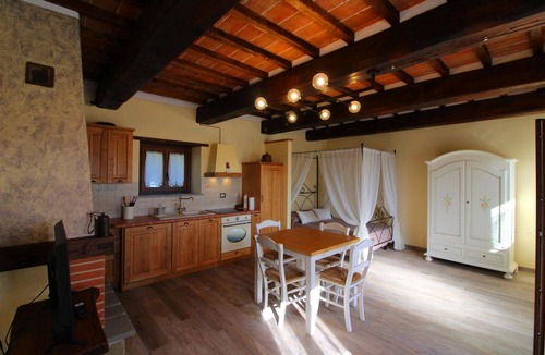Castel Focognano Villa | Part of an old stone country house enjoying a splendid panoramic view over the woods of the Casentin