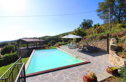 Castel Focognano Villa | Part of an old stone country house enjoying a splendid panoramic view over the woods of the Casentin