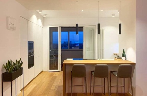 Fossolo Apartment | Penthouse F8 | Rooftop Terrace, Two Towers View