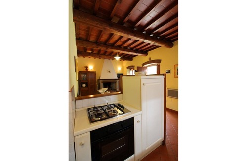 Castel Focognano Villa | Portion of an old stone country house, well-kept garden and private swimming pool. Situated a few km
