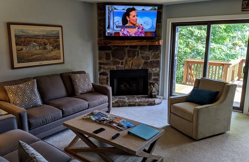 Huddleston House | Power down as hot tub, kayaks, and pool table await, water "footsteps away".